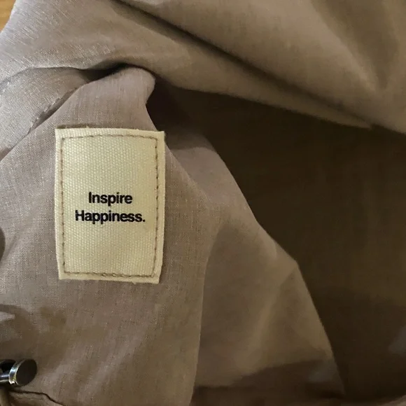 Vuori Women's Light Pink Hooded Rain Jacket - Picture 4 of 5